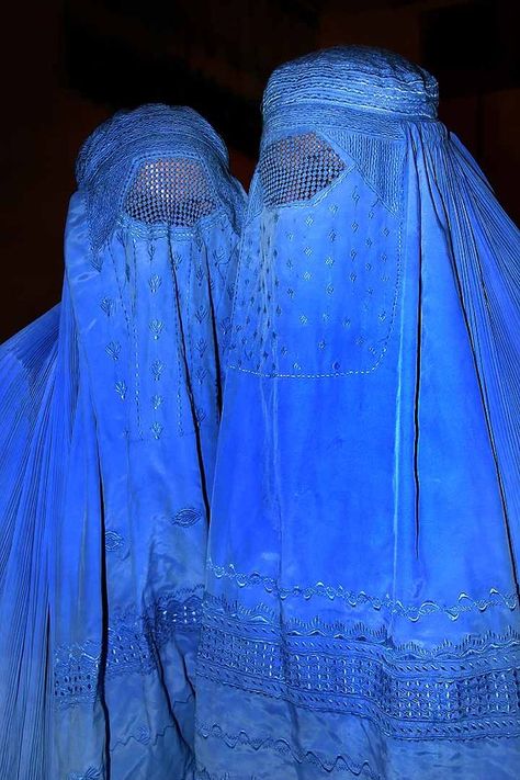 Afghan women wearing shuttlecock burqas, the most concealing of all Islamic veils. It covers the entire face and body, leaving just a mesh screen to see through. Mother Wedding, Hijab Niqab, Blue Theme, We Are The World, Step Mother, Niqab, Ravenclaw, Muslim Women, Country Wedding