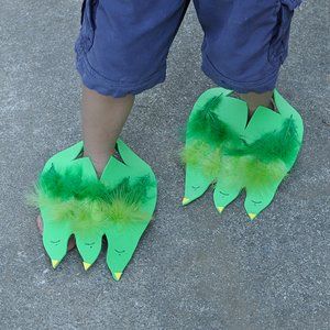 Dino (or Monster) Feet: These Dino / Monster feet are sure to provide plenty of amusement. They are such a simple idea - foam sheets cut into dinosaur feet shapes that can be slipped over the child's foot. Decorate using sharpies, adhesive foam shapes, glue, glitter, buttons, feathers.... A fantastic project for a preschool class, a dinosaur party or for pretend play on a rainy day.   As seen on Broogly: a great source of fun, inspirational and educational projects for kids: www.broogly.com Dinosaur Party Games, Storytime Crafts, Dinosaurs Preschool, Monster Crafts, Monster Theme, Dinosaur Activities, Dinosaur Crafts, Foam Shapes, Preschool Class