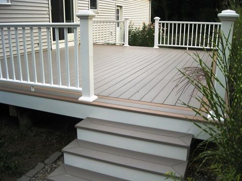 PVC Decking and Rails - Picture 6295 | Decks.com Pvc Railing Ideas, Ground Level Deck With Railing, Deck Colours, Trek Deck, Ground Level Deck, Cottage House Exterior, Patio Railing, Deck Railing Ideas, Deck Remodel