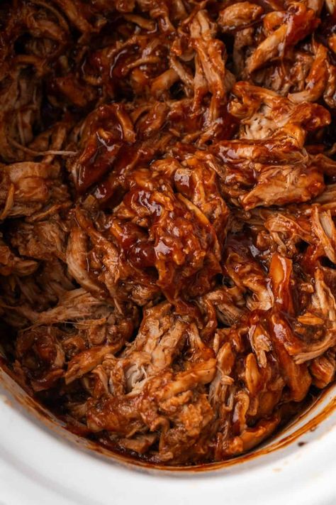 Easy Slow Cooker Pulled Pork is 3 ingredients and uses pork tenderloin for a lighter version. It's juicy, flavorful and great for sandwiches or sliders! Pulled Pork Tenderloin Slow Cooker, Pork Loin Pulled Pork, Pulled Pork Tenderloin, Easy Pulled Pork Slow Cooker, Easy Pork Tenderloin Recipes, Bbq Pulled Pork Slow Cooker, Easy Pork Tenderloin, Pulled Pork Recipe Slow Cooker, Crockpot Pork Roast