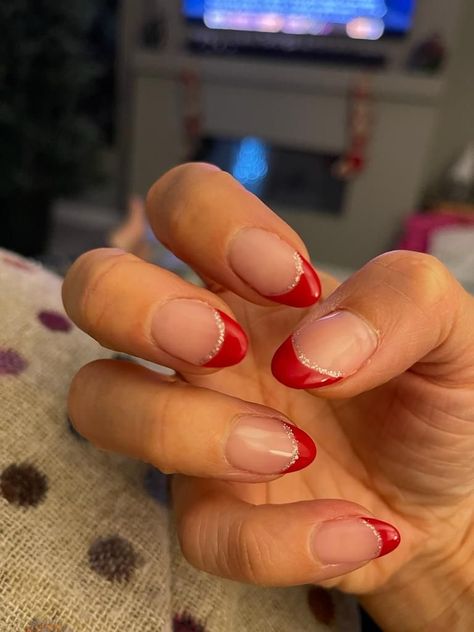 Hoco Nails For A Red Dress, Short Tip Christmas Nails, Red And White Tips Nails, Short Almond French Tip Nails Christmas, Ted French Tips Nails, Red French Tip With Glitter Line, Simply Christmas Nail Designs, Red Christmas Nails Short Almond, Christmas Nails Basic Short