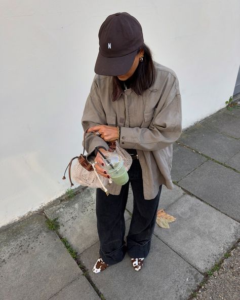 A Sunday fit that I enjoyed. Ft some cow slides for £5 on vinted 🐄 🍵 🧢 @norseprojects 🥿 @vinted 💼 @zara 👖 @freepeopleeu 👕 @palomawooletta     COWPRINT MULES SHOES CANVAS JACKET  STRADAVARIUS  BROWN  AUTUMN OUTFIT  MONTY BAGS  BAGS BY MONTY  RED AUTUMN LOOK OUTFIT Cow Bag Outfit, Cowhide Outfit, Cow Print Shoes Outfit, Zara Outfit 2024 Autumn, Cow Print Shoes, Cow Print Outfit, Mules Outfit, Zara Sneakers, Loafers Outfit