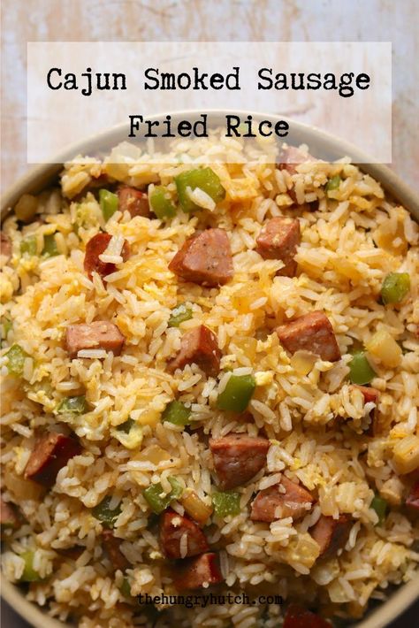 I like to think of fried rice as a method to serve up any type of flavors. Here, I incorporate Cajun smoked sausage and Creole seasoning for a New Orleans-inspired twist. Cajun Fried Rice Recipe, Different Types Of Rice Recipes, Cajun Fried Rice, Cajun Rice Recipe, Cajun Meals, Sausage Fried Rice, Nola Food, Cajun Party, Cajun Rice