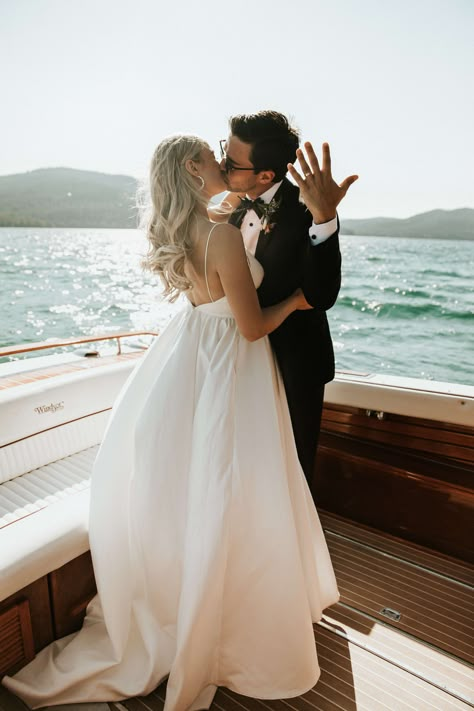 Nicole + Jack: An Elegant and Playful Glacier National Park Wedding | a&bé bridal shop | photo: shannon st. clair | aquarius by vagabond | vagabond bridal | montana wedding | flowy wedding dress | wedding dress satin | wedding photography | bride + groom | wedding boat photos | nautical wedding | lakeside wedding | groom outfit | cool wedding | groom bow tie | simple wedding gown | destination wedding | national park wedding | #aandbebridalshop #vagabond #wedding #weddingphotography #engaged Montana Bride, Boat Photoshoot, Glacier National Park Wedding, Yacht Wedding, Boat Wedding, Boat Cruise, Cruise Wedding, Montana Wedding, Lakeside Wedding