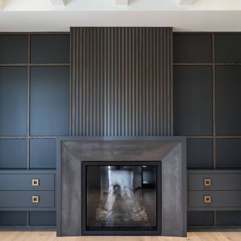 Rockwood Custom Homes on Instagram: “We are in love 🥰 with this wall that features a fireplace with architectural concrete surround, accent wood strapping/paneling and metal…” Trim Fireplace Surround, Interesting Mantles, Fireplace Wall Paneling, Accent Wall And Fireplace, Wood And Tile Fireplace Surround, Fireplace And Bar Wall, White Wood Panel Fireplace Wall, Fireplace Treatments, Wood Plank Wall Living Room Fireplace Surrounds