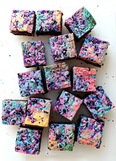 Galaxy Brownies feature swirls of colorful blondie with star speckled, fudgy brownie. Appropriately, this chewy, chocolate deliciousness is “out of this world”!|themondaybox.com Diy Cosmic Brownies, Decorated Brownies Birthday, Colorful Brownies, Space Brownies, Disco Desserts, Brownie Topping Ideas, Blue Velvet Brownies, Galaxy Brownies, Rainbow Brownies