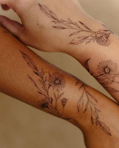 Aster Flower Wrap Around Tattoo, Vine Around Elbow Tattoo, Wrapped Wrist Tattoos For Women, Vine Women Tattoo, Sunflower Vine Wrap Around Tattoo, Moth Tattoo With Leaves, Chrysanthemum Vine Tattoo, Matching Sunflower Tattoos Mom, Marigold Vine Tattoo