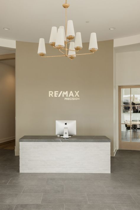 Remax Office Interior Design, Office Real Estate Design, Real Estate Office Ideas Interior Design, Managers Office Design, Remax Office Design, Real Estate Brokerage Office Design, Realty Office Design, Real Estate Office Design Work Spaces, Office Paint Colors Business