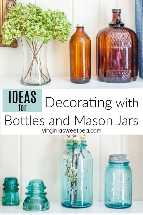 Ideas for Decorating with Vintage Bottles and Mason Jars Old Mason Jars Decor, Antique Jars Decor Ideas, Glass Jar Display Ideas, Canning Jar Decorating Ideas, Things To Put In Glass Jars Display, Blue Jars Decor, Mason Jar Display Ideas, Vintage Glass Bottle Decor Ideas, Vintage Bottles Decor Diy