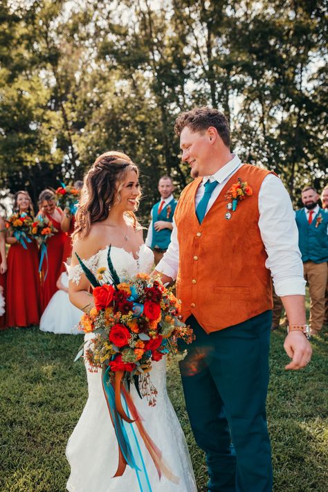 Teal Orange And Cream Wedding, Western Wedding Flowers Turquoise, Purple Teal Orange Wedding, Peacock And Orange Wedding, Teal Orange And Burgundy Wedding, Teal Green And Burnt Orange Wedding, Blue And Orange Wedding Bridesmaids, Dark Teal And Rust Orange Wedding Party, Teal And Coral Fall Wedding