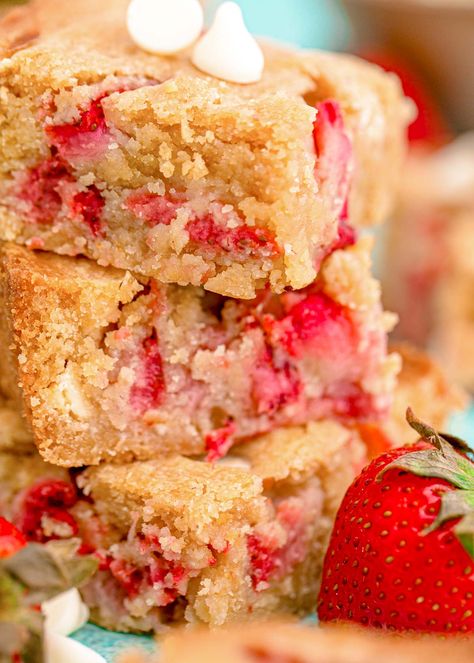 Strawberry Blondies are made with pantry staple ingredients and fresh, juicy strawberries, making them the perfect summertime dessert! An easy-to-make treat that bakes in just 25 minutes! Over Ripe Strawberries Recipes, Fresh Strawberry Pound Cake Recipe, Dessert Using Frozen Strawberries, Strawberry Desserts Gluten Free, Strawberry Brownies From Scratch, Strawberry Blondies Recipe, British Dessert Recipes, Strawberry Lemon Blondies, Strawberry Blondies