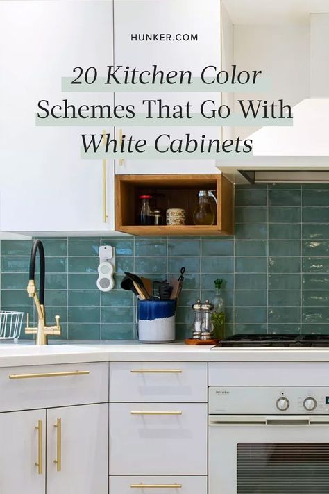 Whether you are thinking of installing white cabinets in your kitchen or you're looking to freshen up your existing cook space, selecting accent colors can be somewhat daunting. #hunkerhome #kitchen #kitchencolor #kitchencolorscheme White Cabinets Color Backsplash, White Kitchen With Pop Of Color, Colourful Kitchen White Cabinets, Kitchen White Cabinets Colored Walls, White Cabinets Colored Walls, White Kitchen With Accent Color, Kitchen Cabinet Color Ideas With White Tile Floors, Kitchen Cabinet Accent Color, Kitchen Wall Paint Colors White Cabinets