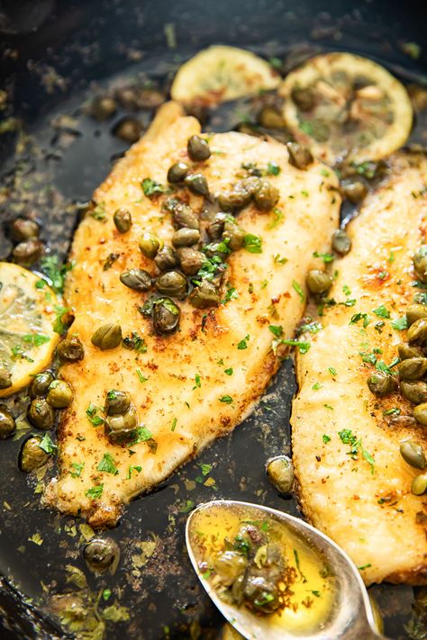 Tender sole fish cooked in a lemon butter sauce with capers. A classic Sole Meuniere recipe that comes together in minutes! Tilapia With Capers And Lemon, Fish Capers Lemon Recipe, Fish In Butter Sauce, Fish With Capers Butter Sauce, Fish Meuniere Recipe, Lemon Sole Fish Recipe, Fish And Capers Recipe, Fish With Capers And Lemon, Lemon Caper Fish