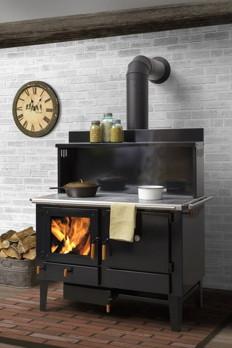 The Obadiah Wood Cook Stove is handmade in Lancaster County, Pennsylvania, and is “built for functionality, at a no-frills price,” the company says. The glass firebox door provides a view of the fire, and the oven door is available in a glass option. Prices start at $2,750. (Also see Obadiah’s exhaustive range of wood-burning cookstoves here.) Wood Cookstove, Wood Cook Stoves, Wood Burning Cook Stove, Stoves For Sale, Wood Fired Cooking, Wood Stove Cooking, Kitchen Queen, Wood Stove Fireplace, Homesteading Ideas