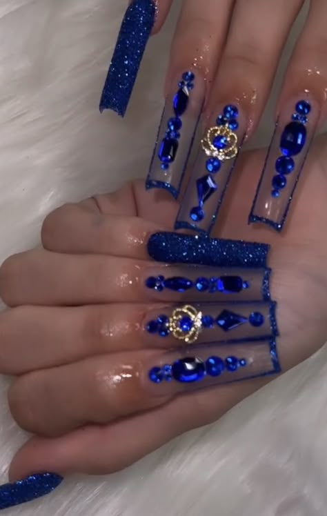 Blue Nails Bling, Long Blue Nails Acrylic, Royal Blue Baddie Nails, Blue Glam Nails, Dark Blue Quinceanera Nails, Nails Acrylic Royal Blue, Quinceanera Nails Dark Blue, Rhinestone Blue Nails, Long Dark Blue Nails