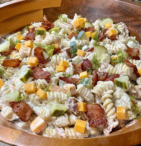 A decadent pasta salad filled with bacon, dill pickles and cheese and flavored with a creamy ranch sauce that everyone loves! Pickle Pasta Salad Recipe, Creamy Ranch Sauce, Pickles And Cheese, Pickle Pasta Salad, Pickle Pasta, Bacon Pasta Salad, Dill Pickle Pasta Salad, Bacon Ranch Pasta, Taco Pasta Salad