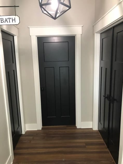 Black Interior Doors With White Trim, Black Baseboards, Interior Door Colors, Black Hallway, Dark Doors, Interior Door Trim, Black Interior Doors, Basement Plans, Wainscoting Panels