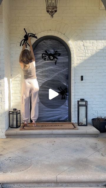 Lauren Clutter on Instagram: "Not a big Halloween decorator, but when the kids get this excited, how can I resist? 😅 Turned our front door into a spider’s dream with a few easy, budget-friendly touches! The kids are obsessed with their ‘spooky spiders’—and honestly, it might be growing on me too. 🕷️🕸️

Anyone else get pulled into holiday decorating for the kids? Let me know your favorite Halloween DIYs in the comments! 🎃

For links to spiders, webs, and lanterns comment SPOOKY

#HalloweenDecor #MomLife #SpookySeason #DIYHalloween #FamilyFun https://liketk.it/4Rx5U" Halloween Door Decorations Spider Web, Outdoor Halloween Theme Ideas, Diy Spider Web, Spiders Webs, Spider Theme, Halloween Decorations For Kids, Easy Budget, Spooky Spiders, Halloween Door Decorations