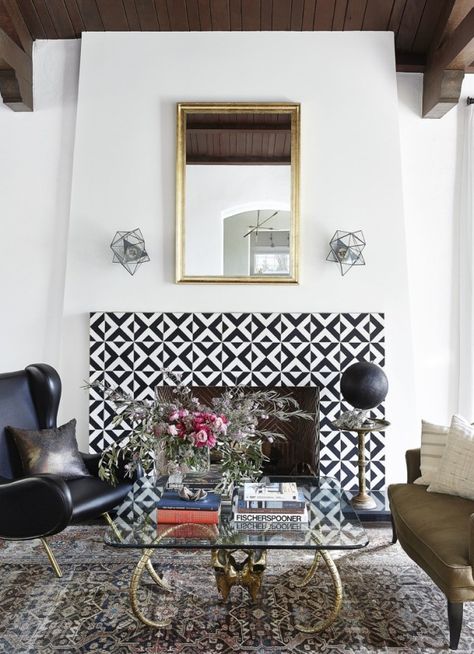 11 Encaustic Tile Ideas You *Need* in Your Home This Year via Brit + Co Tiles Fireplace, Tiled Fireplace, Fireplace Tiles, Fireplace Tile Surround, Tile Fireplace, Fireplace Hearth, Black And White Tiles, Fire Places, Cement Tiles