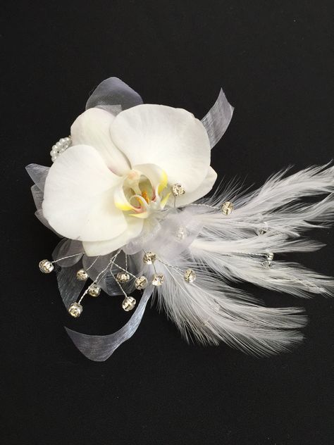 Corsage With Feathers, Prom Wristlet, Orchid Wrist Corsage, November Wedding Flowers, Feather Corsage, Wristlet Ideas, Corsage For Prom, Silver Anniversary Party, Flowers At Wedding