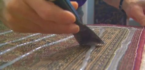 While you could use double stick carpet tape or a nonslip rug pad to keep them from sliding, a simpler solution is to apply a bead of silicone caulking to the bottom of the rug. How To Make Rugs Not Slip, How To Keep Rugs From Slipping, Make A Rug, Putty Knife, Rug Backing, Silicone Caulk, Carpet Tape, Decorated Wine Glasses, Diy Hack