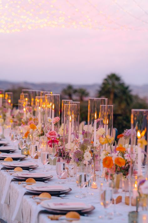 Wedding Color Schemes Romantic, Colored Glasses Wedding Table, Meadow Wedding Aesthetic, Wedding Flowers Summer Centerpieces, Multicolor Wedding Flowers, Wedding Table Settings Colorful, Wedding Tablescapes Candles, Long Table Floral Arrangements, Modern Wedding Color Schemes