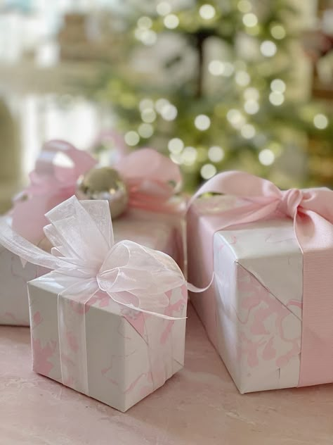 Today I am sharing how to wrap a gift with homemade wrapping paper and bows. I also decided to try a new color palette because I love pink! I have a confession to make. I use to wrap all of my gifts on Christmas Eve. I think I was so busy with baking for our … Homemade Wrapping Paper, Professional Gift Ideas, Creative Corporate Gifts, Pretty Gift Wrapping, Pretty Gift Wrapping Ideas, Christmas In Pink, Holiday Gift Tags Printable, 100 Year Old Home, Gift Wrapping Station