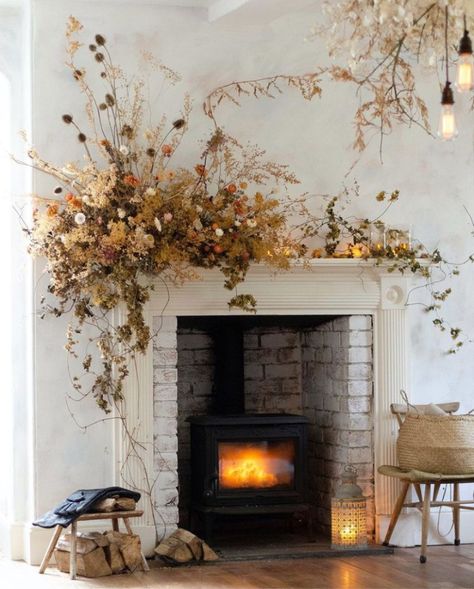 Décor | Holiday Decorating Trend: Sculptural Garlands Traditional Fireplace Mantle, Floral Archway, Decorate For Fall, Flower Installation, Floral Chandelier, Floral Installations, Traditional Fireplace, Mantle Piece, Mantel Decor