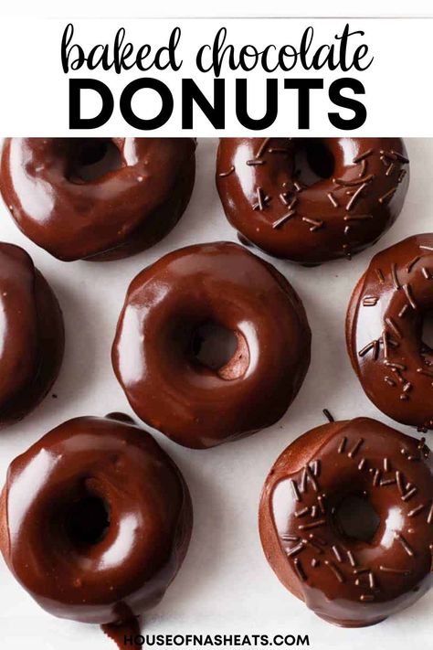 These fluffy and soft Baked Chocolate Donuts topped with a thick and rich chocolate glaze that sets up just like the kind at the donut shop. They are a chocoholics' dream come true and a perfect treat any time of the day! | baked chocolate donuts recipe easy | chocolate baked donuts with donut pan | chocolate baked donuts recipe | baked doughnuts chocolate | baked chocolate doughnuts recipe | baked donuts chocolate glaze | breakfast donuts baked | baked donuts with donut pan breakfast recipes Donut Ganache Recipe, Best Baked Donuts With Donut Pan, Chocolate Yeast Donut Recipe, Baked Donuts Without Donut Pan, Baked Donut Recipes With Donut Pan, Healthy Baked Donut Recipes, Donut Recipes Baked, Doughnut Recipe Baked, Donut Pan Recipes