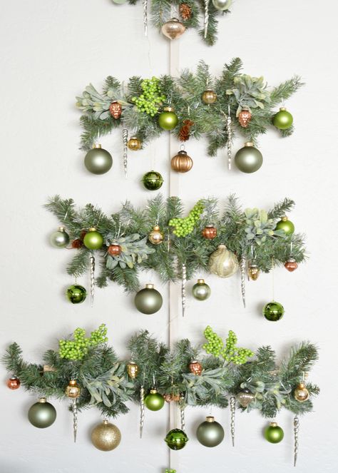 DIY Wall Christmas Tree | Centsational Style Outside Garland, Diy Wall Christmas Tree, Wall Mounted Christmas Tree, Diy Christmas Backdrop, Wall Hanging Christmas Tree, Wall Hanging Christmas, Wall Christmas Tree, Bohemian Christmas, Christmas Tree Background