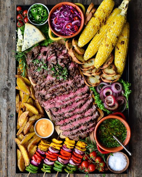 Grilled Flank Steak with Chimichurri Grilled Flank Steak With Chimichurri, Backyard Nook, Flank Steak With Chimichurri, Marinated Onions, Steak With Chimichurri, Crispy Potato Wedges, Roasted Potato Wedges, Stilton Cheese, Roasted Potato