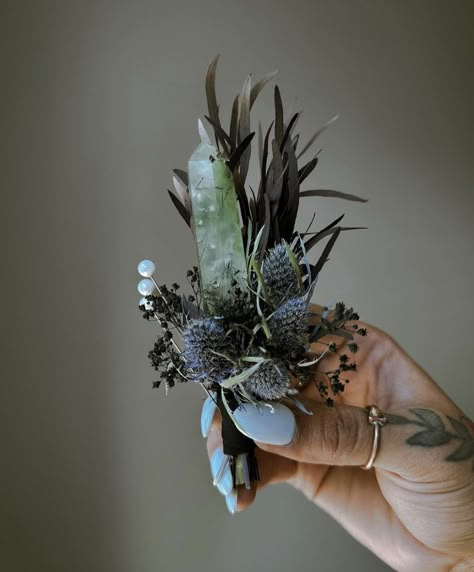 Dark Elf Wedding, Green Witch Wedding Ideas, Crystal Wedding Theme Decor, Witchy Bouquet Wedding, Witchy Boho Wedding, Witchy Floral Arrangements, Woodland Fairy Wedding Bouquet, Crystal Handle Bouquet, Witchy Wedding Flowers