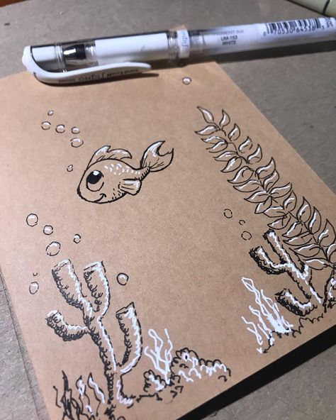 Mary Barrows on Instagram: “Playing with my new white gel pen 🖊 #drawing #gelpen #white #fish #tonedpaper #underwater #ink” Drawings With White Pen, White Gel Pen Art, Gel Pen Doodles, Cute Diy Cards, Pen Arts, Gel Pen Drawings, Gel Pen Art, Black Paper Art, Pen Projects