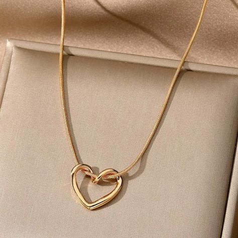 Elevate your everyday style with our stunning heart necklaces! 💖 Crafted from durable stainless steel in a timeless gold finish, these necklaces are the perfect accessory to add a touch of love and elegance to any outfit. Get Now for free shipping and low price 💥👇 https://glowonlinestore.com/products/simple-love-heart-necklace-for-women . . #heartnecklaces #stainlessteeljewelry #goldjewelry #womensnecklaces #fashionjewelry #statementnecklaces #minimalistnecklaces #delicatejewelry #trendyneckl... Jewellery Photo, Pendant Necklace Simple, Mens Jewelry Necklace, Hollow Heart, Waterproof Jewelry, Cute Charms, Men's Necklace, Mua Sắm, Heart Pendant Necklace