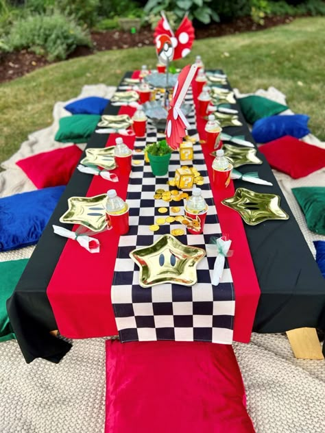 Mario Go Kart Birthday Party, Mario Kart Bday Party, Super Mario Bros Party Table Ideas, Mario Birthday Party Table Set Up, Backyard Mario Party, Mario Kart Centerpiece, Mario Birthday Party Aesthetic, Mario Party Goodie Bags, Mario Kart 8 Birthday Party