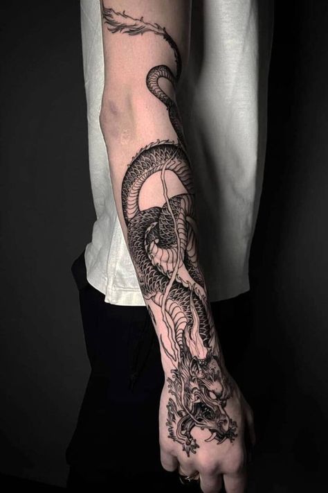 Explore the best meaningful forearm tattoo ideas for men with designs that carry deep significance. Small Tattoos For Men Meaningful, Wrap Around Tattoo Men, Dragon Tattoo On Forearm, Sleeve Tattoo Ideas Men, Inner Forearm Tattoo Men, Tattoo Ideas For Men Arm, Dragon Tattoo Wrapped Around Arm, Dragon Tattoo Forearm, Arm Tattoos For Women Forearm