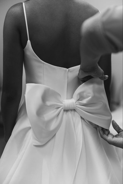 wedding dress bow wedding details dress inspo bridal look Black Bow Wedding Dress, Bow Behind Dress, High Neck Wedding Dress With Bow, White Wedding Dress With Bow, Simple Elegant Wedding Dress With Bow, Bow Detail Wedding Dress, Mini Wedding Dress With Bow, Bridal Gown With Bow, Silk Wedding Dress Bustle