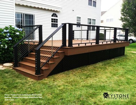 TimberTech Evolutions Brown Oak decking with TimberTech Black Evolutions Rail with Cable. Built by Keystone Custom Decks. Pergola Vines, Pergola Metal, Deck Skirting, Deck Railing Design, Black Deck, Deck Pictures, Patio Deck Designs, Deck Designs Backyard, Front Deck