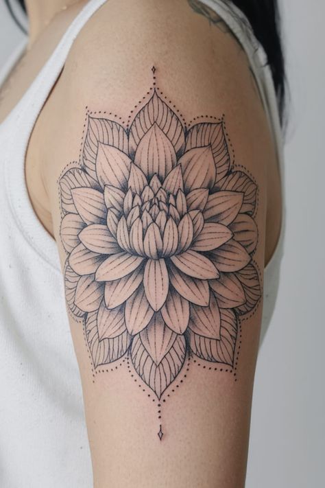 For a detailed and intricate design, create a dahlia tattoo where the petals transition into mandala patterns. This arm tattoo blends the softness of the flower with the complexity of mandala shapes, creating a mesmerizing and balanced piece. Dahlia Mandala Tattoo, Dahlia Flower Tattoo, Dahlia Flower Tattoos, Mandala Shapes, Firefly Tattoo, Dahlia Tattoo, Mandala Flower Tattoos, Celestial Tattoo, Astrology Tattoo