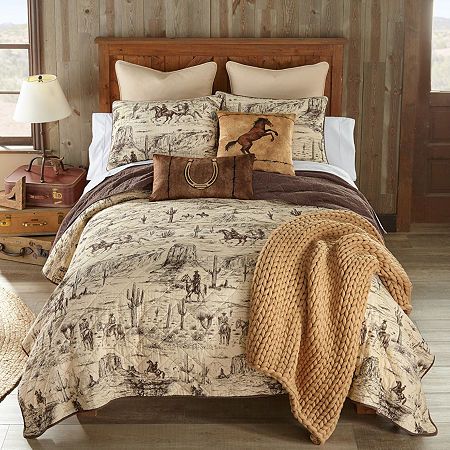 Saddle up for style and get ready to embark on a wild west adventure with the donna sharp cowboy cotton quilt set. This striking bedding ensemble captures the rugged spirit of the frontier with its captivating whole cloth design. Featuring sketched cowboy figures, graceful horses, and iconic cacti set against a desert landscape backdrop, the cowboy quilt set transforms your sleeping space into a western oasis. With a color palette of rich chestnut brown and soft cream, this quilt set evokes the warmth and earthy charm of the desert landscape. This bedding ensemble serves as a captivating reminder of the untamed beauty of the American southwest. 100% cotton, 50/50 cotton/poly fill. Prewashed to prevent shrinkage and fading. Machine wash cold, do not bleach, tumble dry low. Each set includes Cowboy Quilt, Western Quilts, Western Rooms, Western Bedding, Ranch Hand, Cotton Quilt Set, Western Bedroom, Cloth Design, Inspire Me Home Decor