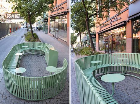 Created from green painted steel, this sculptural outdoor dining area, integrates seating, tables and recycling. #OutdoorSeating #StreetFurniture Modern Public Seating, Innovative Outdoor Seating, Utopia Ideas, Communal Seating, Outdoor Seating Ideas, Landscape Furniture, Urban Furniture Design, Cafe Seating, Public Space Design