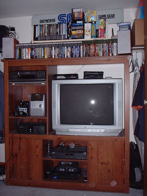 Here's my gaming set up. Everything is crammed most efficiently into my closet. By day it all hides away behind two big folding doors but by night (or mid-afternoon) it is a bustling hive of gaming and/or TV/movie watching.     Tai game di dong http://azgames.biz ngay bay gio Gaming Closet, Older Brother Core, Retro Games Room, Tokyo Hotel, New Retro Wave, Dragon City, Movie Watching, Retro Room, 2000s Nostalgia