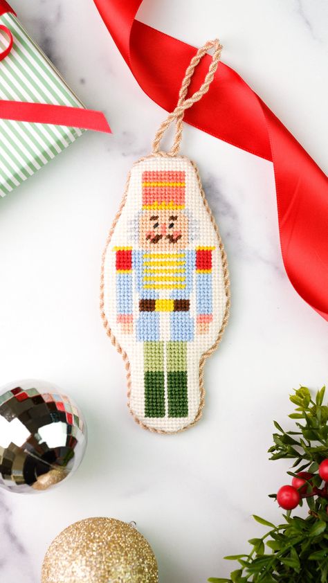 The Blue Nutcracker is a beautiful 2” x 5” design hand-painted on 13 mesh, with a total canvas size of approximately 6" x 9". The perfect size for finishing into an ornament or a standup. Great for beginners and seasoned stitchers alike! Shop full Holiday Kit collection "Canvas Only" option includes: Hand painted needlepoint canvas One size 20 tapestry needle "Full Kit" option includes: Hand painted needlepoint canvas Two size 20 tapestry needles Lovely Silk & Ivory threads to complete your proj Nutcracker Needlepoint, Green Nutcracker, Blue Nutcracker, Needlepoint Christmas Ornaments, Needlepoint Stockings, Needlepoint Ornaments, Cross Stitch Christmas Ornaments, Needlepoint Christmas, Needlepoint Designs