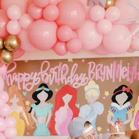 Jessica Crum on Instagram: "in our princess era 👑💖 what a special day celebrating our sweet girls. brynnleigh just turned FOUR & brooklyn turns ONE next week! (how is that possible? I swear I just had her 😭). so we celebrated like royalty with friends, family, and even our favorite princesses! those excited squeals will forever be embedded in my brain. never grow up, my girls.   shout out to my amazing vendors who helped pull this together 🫶🏼 balloons: @ohsnapletsparty  paint banner: @afterninedesigns  tables & chairs: @houstontentsevents  cake & cupcakes: @buttercuphouston  princesses: @fairestofallparties  dresses: @tutudumonde 📸: @therosemaryhen" Princess Theme Sleepover, Princess Fifth Birthday Party, Four Year Old Princess Party, Second Birthday Princess Theme, Princess Birthday Party Three Year Old, Forever A Princess, Disney Princess Third Birthday Party, Princess Birthday Party Crafts, Birthday Theme For 4 Year Girl