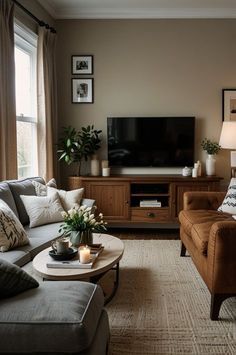 Tv Less Living Room, Small Living Room Big Tv, Small Tv Den Room Ideas, Cozy Warm Living Room Design, Raised Ranch Living Room Layout Ideas, Small Living Room Tv Wall Ideas, Man Apartment Decor, Tv Placement In Living Room, Cosy Tv Room