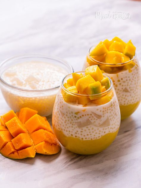 Calling all mango lovers! This Mango Bango will be your favorite dessert. A Filipino dessert made from Mangoes, Nata de Coco, and Tapioca pearl (sago) served with sweet condensed milk. How creamy, tropical, and refreshing it is! Who doesn’t love a recipe where you can just throw everything in a bowl and call it a day? The only thing that needs to be cooked is the sago or tapioca pearls. Mango Bango also called Mango Sago is a Filipino dessert inspired by Buko Salad and/or Fruit Salad. it is w... Mango Tapioca Desserts, Shrimp Recipes Garlic Butter, Mango Tapioca Logo, Shrimp Pasta Butter Garlic Sauce, Taho Filipino Dessert Aesthetic, Hawaiian Garlic Butter Shrimp, Butter Shrimp Recipes Garlic Filipino, Mango Bango, Mango Sago Dessert Recipe