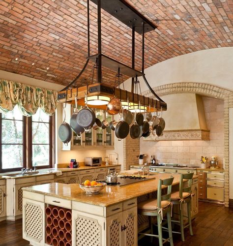 Pots and pans hanging over kitchen island. Love brick ceiling. Rustic Italian Decor, Pot Rack Kitchen, Vaulted Ceiling Kitchen, Hanging Pans, Diy Storage Rack, Pot Rack Hanging, Mediterranean Kitchen, Brick Kitchen, Pot Racks