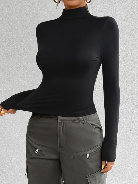 Mock Neck Long Sleeve T-Shirt 🌟 Dive into comfort with our Mock Neck Long Sleeve T-Shirt! 🌟 ✨ Basic never looked better - Opaque & ultra-stretchy! 👗 Sizes: S to XL - Perfect fit for every body! 🧵 Made from 92% polyester & 8% elastane, handle with care — Machine wash cold & tumble dry low. 🇺🇸 FREE SHIPPING across the US. Grab yours and feel the blend of style and comfort! 💖✨ #FashionEssentials #ComfortWear #FreeShipping https://belongandbe.com/products/mock-neck-long-sleeve-t-shirt Mock Neck Long Sleeve, Basic Fits, Plus Size Beauty, Mock Neckline, Womens Long Sleeve Shirts, Winter Clothing, Swimwear Cover Ups, Swimwear Cover, Basic Style