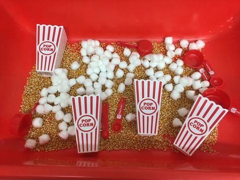 A fun sensory table idea for a circus theme. Carnival Sensory Bin, Fair Theme Preschool, Circus Sensory Bin, Circus Sensory, Carnival Crafts For Kids, Popcorn Activities, Preschool Carnival, Preschool Circus Theme, Circus Preschool