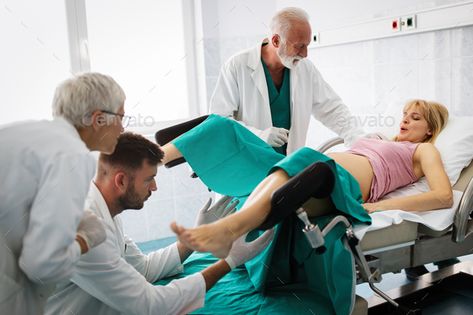 In the hospital woman in labor pushes to give birth, obstetricians assisting Woman In Hospital, Gynecologist Visit, Gynecologist Exam, Percabeth Fanart, Normal Birth, Birth Pictures, Pelvic Floor Therapy, Medical Photography, Massage Therapy Techniques